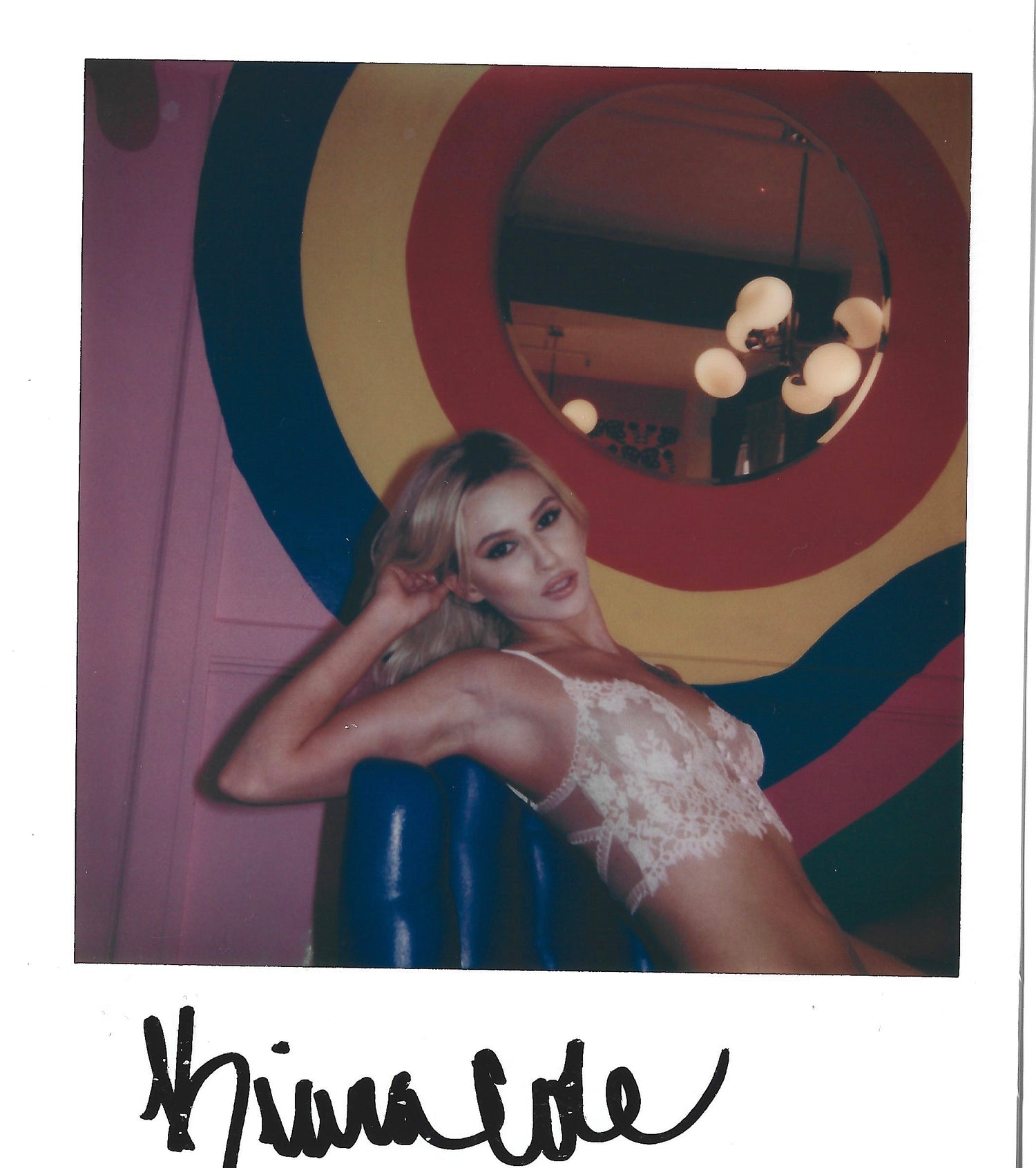 Signed Polaroid Photos